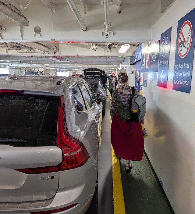 walking from the car parked on the car deck