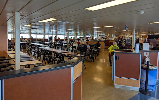 seating area for the largest of the food courts the Coastal Cafe on deck 5 