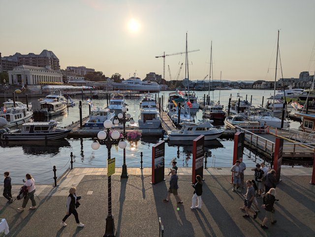 boats along piers near sunset 