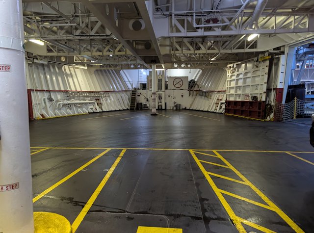 view of the bow of the car deck area of the ferry