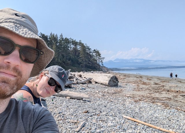 Selfie while resting on some logs along the spit