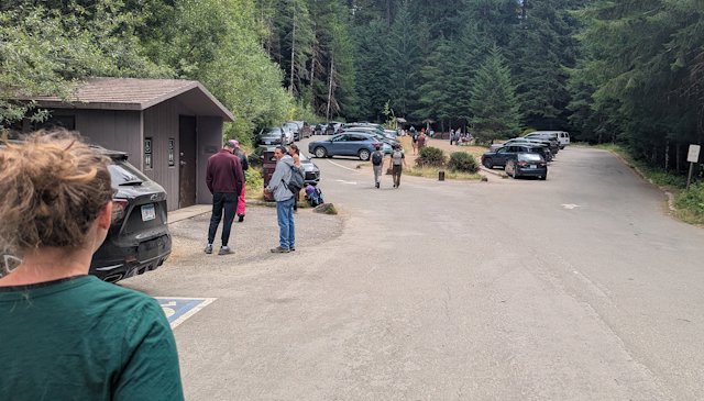 parking lot and a bathroom for the trails